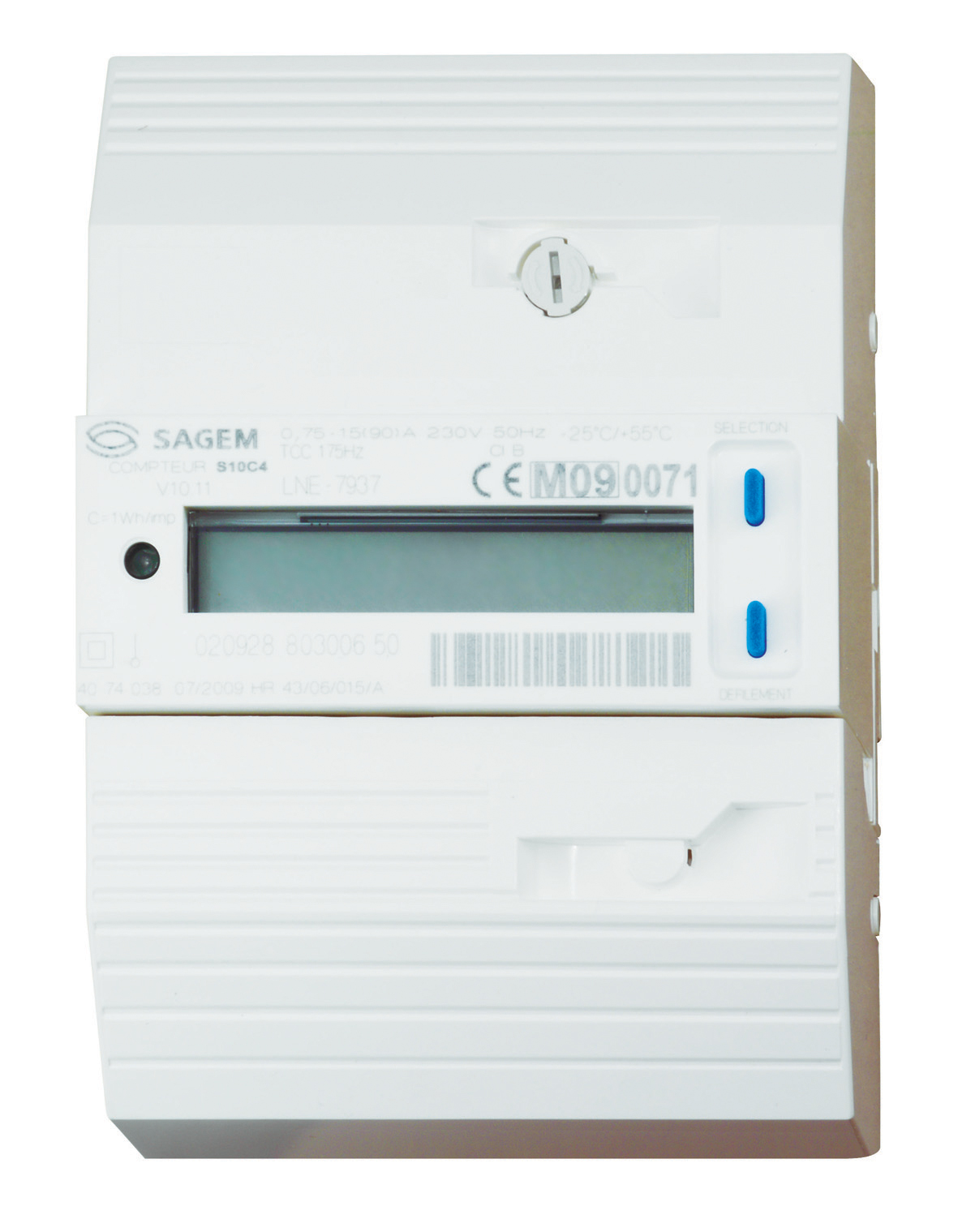 Compteur blanc fermé, grand afficheur LCD et deux boutons bleus sur la droite ; inscriptions SAGEM et S10C4 visibles.